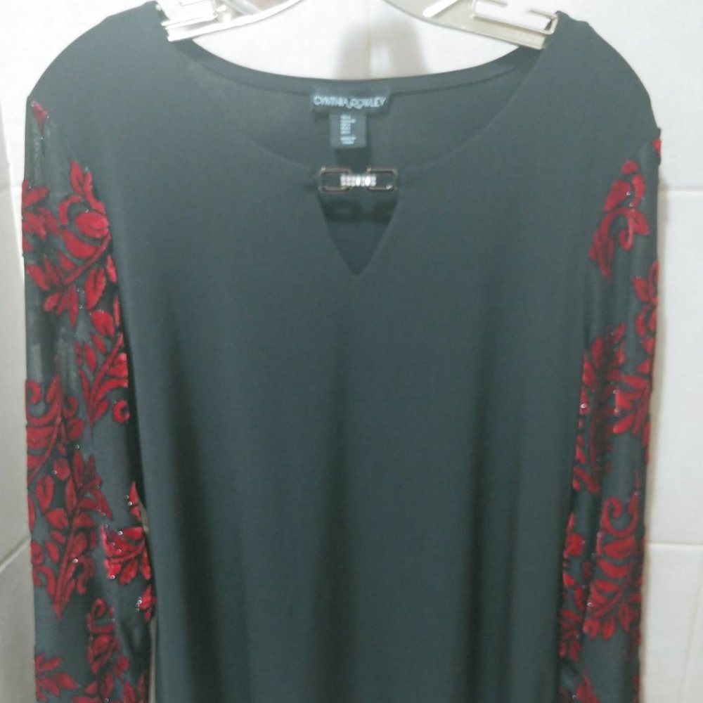 black blouse with  jeweled neck/red sleeve design